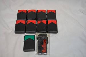 lot 297 image: Marlboro Black and Red Zippo Lighters, Black and Green Lighter and Square Lighter, 10 Total