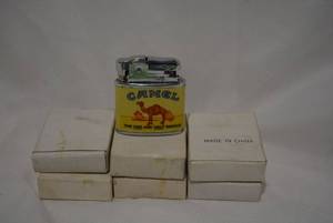 lot 307 image: Camel The One and Only Smoke Lighters, 7 Total