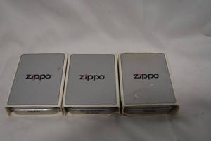 lot 311 image: Camel Zippo Lighters, 3 Total