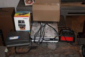 lot 25 image: Vintage Polaroid 340 Camera, Polaroid Mobile Printer, and Alarm Clock