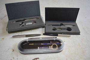 lot 40 image: Pena dn Keychain Sets Engraved with - Cross, Nelson Mason, Hollywood Premiere and Dallas Bulk Mail Center