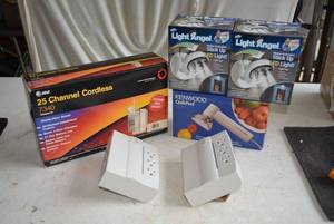 lot 45 image: Pivot Stick Up LED Lights, 25 Channel Cordless Phone, Side Socket 3 Prong Sockets
