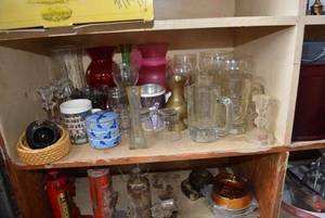lot 50 image: Misc. Lot Purple Iridescent Ruffled Compote, Glassware, Colored Vases, Lead Crystal Candle Holders, Brass Vase and More