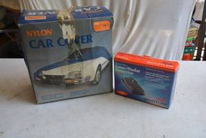 lot 57 image: Nylon Car Cover (Size 7X) and Whistler LaserRadar Detector