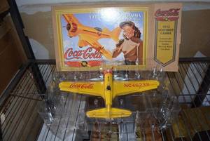 lot 60 image: Coca-Cola 1932 Northrop Gamma - Replica Airplane Die-Cast Coin Bank