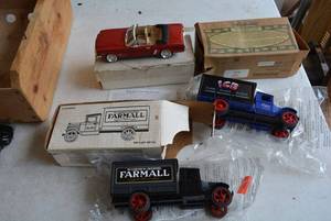 lot 63 image: Die Cast Metal Trucks - (1931 Hawkeye Truck and Farmall Truck) and 1964 Ford Mustang