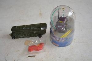 lot 70 image: Oscar Mayer Whistle Unopened, Micro Tuners Car Unopened,  Metal Train engine