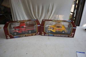 lot 72 image: Die Cast Replicas 1934 Ford Pick UP and 1932 Ford Roadster Street Rod, Both In Packaging