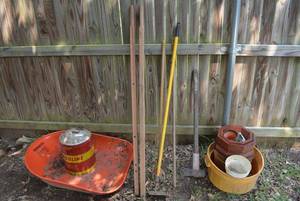 lot 243 image: Wheelbarrow (Missing Frame), Metal Gas Can, Planters and Yard Tools