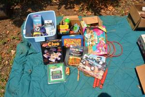 lot 258 image: Autographed Monster Truck Posters, Vintage Barbie (Still in Package), and More Games (BIN NOT INCLUDED BRING BOXES)