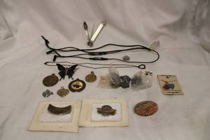 lot 390 image: Pin, Pendants and Glasses Holder