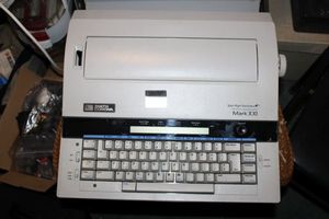 lot 204 image: Smith Corona Typewriter and Correctable Ribbon Pack
