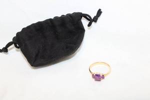 lot 396 image: Sterling silver vermeil (gold over sterling) Amethyst three stone ring. Marked 925. Size 10. With storage bag. Amethyst tested. Deep rich color - possibly African Amethyst.