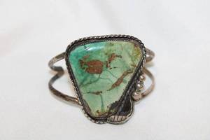 lot 401 image: Sterling silver artisan crafted Mohave Green Turquoise open cuff bracelet. No markings.