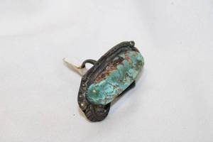 lot 409 image: Sterling silver artisan crafted Green Mohave Turquoise ring. No markings. Size 4.75