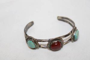lot 410 image: Sterling silver artisan crafted Turquoise and Coral open cuff station bracelet. No markings. 2.5W
