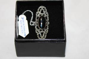 lot 414 image: Sterling silver marcasite and Black Onyx filigree ring. Marked 925 Thailand. Size 6. In box.