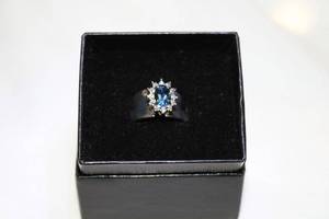 lot 415 image: Sterling silver Absolute and prong set faceted London Blue Topaz gemstone wide band ring. Marked 925. Size 7  in box. Gemstone tested.