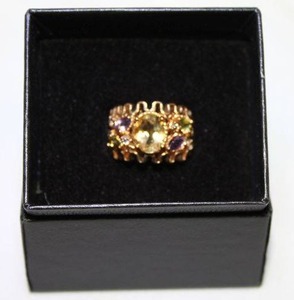 lot 416 image: Sterling silver Technibond vermeil (18K gold over sterling) and prong set multi gemstone ring. Marked 925. Size 6  in box. Gemstones tested. Includes Blue Topaz, Citrine, Amethyst, Peridot
