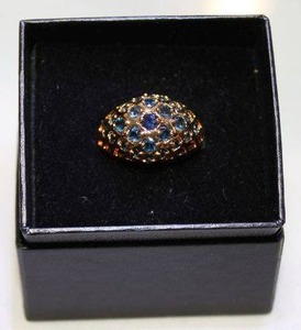 lot 417 image: Sterling silver Technibond vermeil (18K gold over sterling) and 1.90 ctw Sapphire dome cluster ring. Marked 925. Size 9 in box. Sapphires tested