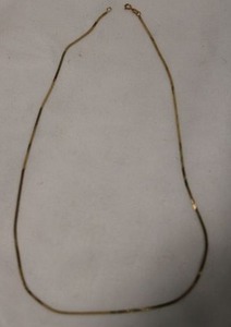 lot 418 image: 14K yellow gold Serpentine necklace. Marked 14K. 19L