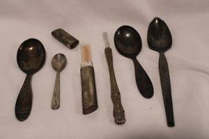 lot 432 image: Silver plate selection. Includes (3) spoons, knife handle and toothpick holder.