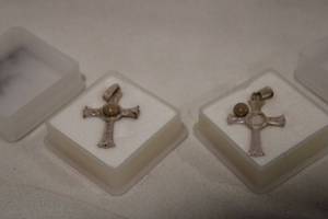 lot 446 image: (2) Sterling silver and Jerusalem stone cross pendants. Marked Jerusalem Cavalry 925. One stone needs reglued. Made in Spain.