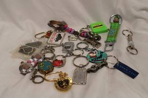 lot 457 image: Keychain selection. Includes novelty and advertising keychains.