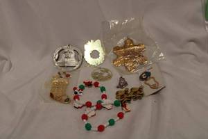 lot 459 image: Holiday themed jewelry. Includes Hallmark and Texas A & M ornaments, plus