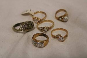 lot 461 image: 14-18K HGE electroplate rings. Varying designs. 2 are misshapen.