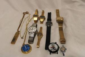 lot 469 image: Watch group. Includes Dallas Cowboys watch face, Timex, Armitron, Savant, Pierre Cardin, Clinton 17 Jewel Plus