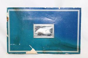 lot 477 image: Sterling Silver Franklin Mint 1977 Santos Dumont Demoiselle. Worlds Great Aircraft  (Sealed) Ingot. 1000 grain