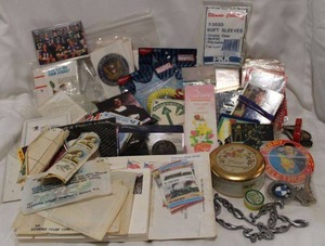 lot 515 image: Misc. Lot Marvel Keychains, Stamps, Trading Cards, Anniversary Jewelry Box, BMW Keychain, and More