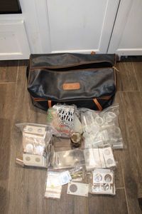 lot 528 image: Currency Holders Plastic and Paper Coin Tubes Plus Duffle Bag