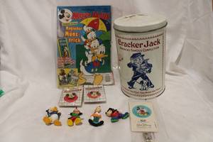 lot 535 image: Disney Toy Figures, Flashers Pins, Magazine in German Plus Cracker Jack Tin