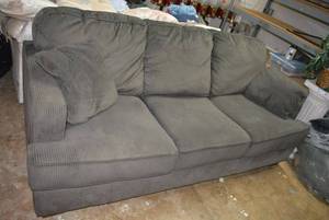 lot 104 image: Ashley Furniture Gray Sleeping Sofa 7 x 32 x 3