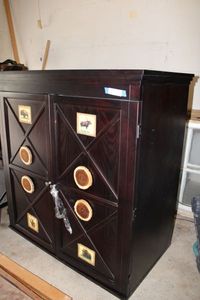 lot 12 image: 2-Piece EntertainmentArmoire Cabinet with Nature Accents, Large Piece, see all pictures