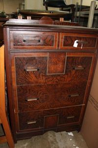 lot 10 image: Antique 4-Drawer Dresser with Wheels, Matches Desk Lot 15