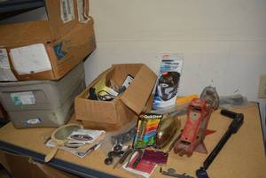 lot 68 image: Misc. Jack Stand, Roadster Emblem, Car Lighter, Hardware and More