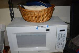 lot 224 image: GE Microwave, Ball Caps and T-Shirt