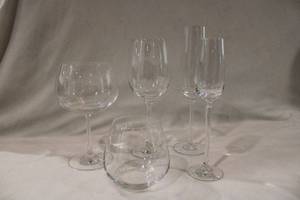 lot 301 image: Collection of Crystal German Schott Zwiesel glasses. All etched on bottom. 5 count No chips. Includes Scott Zwiesel Triton Pure Champagne Flute. All marked.
