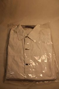 lot 365 image: Dolce & Gabbana blouse with metal buttons, Size Small Striped button placket. Labels intact. Buttons all snap.