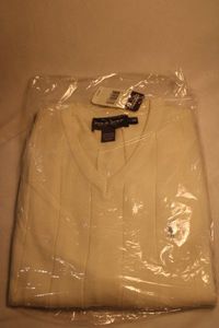 lot 385 image: POLO GOLF sleeveless swerater New With Trags. Striped cream color with light blue emblem. 100% cotton. Orig retail tag $69.50