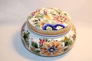 lot 333 image: Delft (Holland) Pottery lidded bowl featuring polychrome floral and birds. Hand painted. Most Delft is Blue & White. Less color is produced. 6.5W x 3.5H approx. Marked on bottom LGE Delftse Pauw