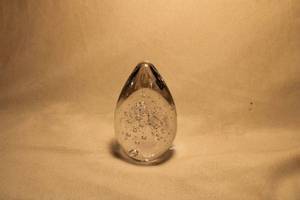lot 345 image: KONST Glashyttan URSHULT Swedish studio art glass Egg Shaped controlled bubble paperweight.