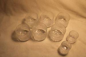 lot 338 image: (8) 1968 Littala Ultima Thule footed tumblers by Tapio Wirkkala (Finland), Pinnchen Series. Set of 6 tumblers and 2 shot glasses. 8 oz. Tumblers 2 34 X 2 34