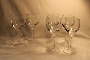 lot 316 image: (4) Crystal stemmed water glasses in the style of Waterford Carleton with ridged stems , clear foot 8H. Includes (2) additional glasses with flea bites