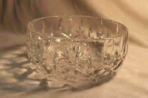 lot 322 image: Vintage Large heavy Cut Glass Bowl Cut Crystal Serving Bowl in the style of Waterford Lismore (probably Astoria Grand) 9.25H x 4.5H. Weighs over 7 lbs. made of heavy lead crystal with a beautiful cut pattern around the sides and bottom.