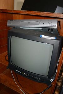 lot 81 image: Sylvania TV Model SST4131 and Hiteck DVD Player