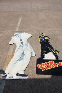 lot 228 image: Movie Cardboard Cutouts of The Mask and Dick Tracy